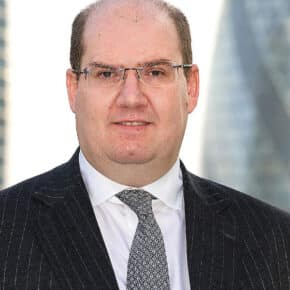 Buy-Side Profile: Darren Bustin, Schroders Solutions