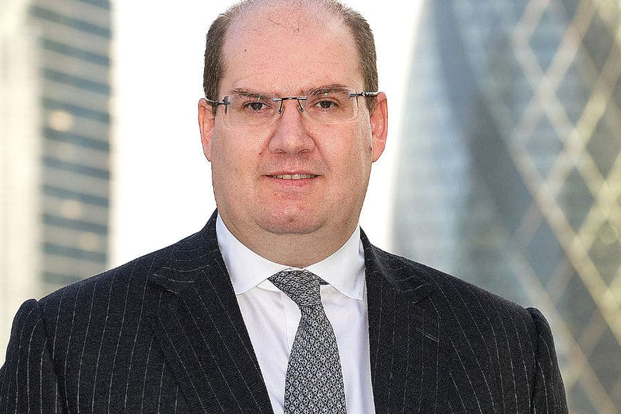 Buy-Side Profile: Darren Bustin, Schroders Solutions